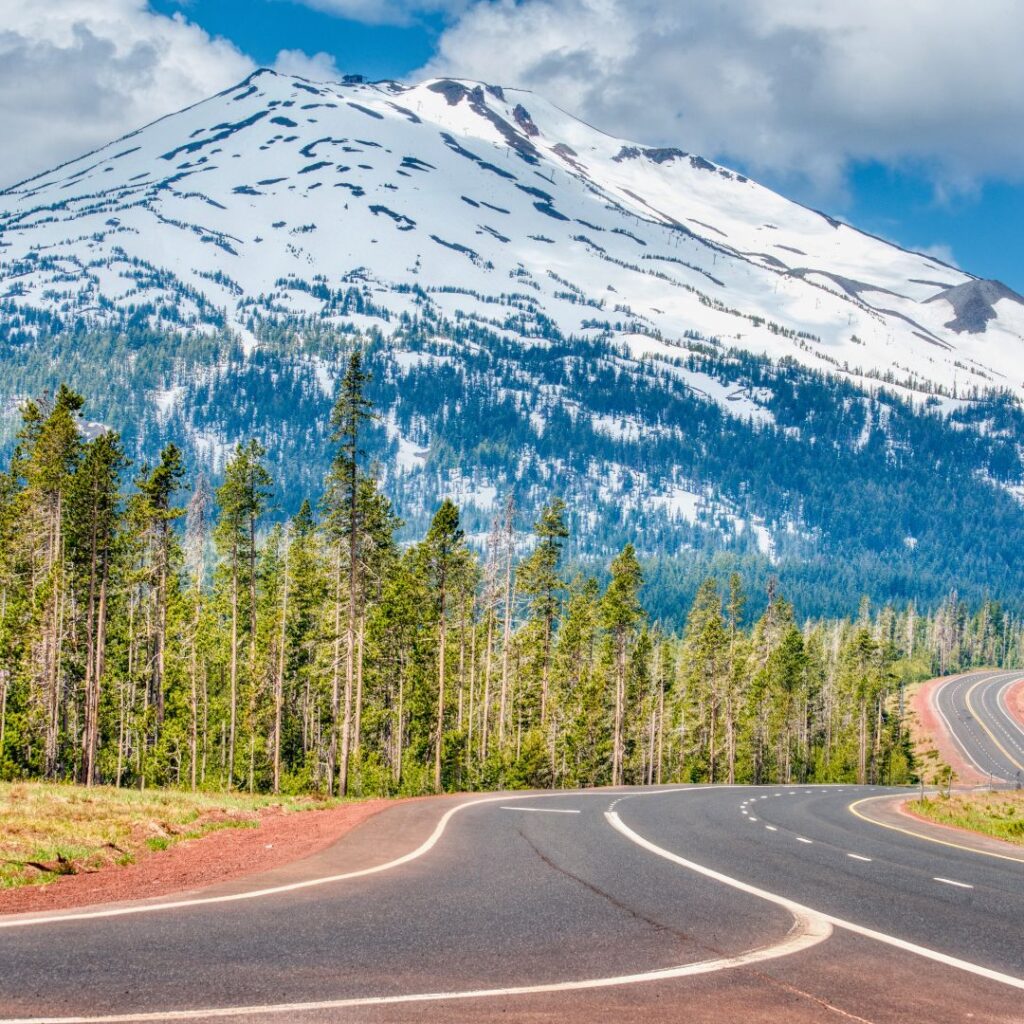 clear winding roads in front of Mount Rainier, showcasing the beauty of this top mountain destination in the U.S. 2025, perfect for winter adventures