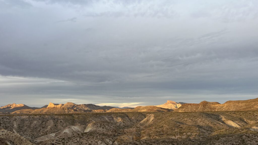 Landscape view of driving along Ross Maxwell Scenic Drive in Big Bend National Park, highlighting dramatic desert scenery on a classic national park scenic drive.