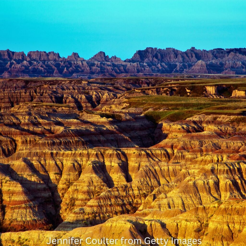 Pinnacles Overlook at Badlands National Park with panoramic views of the jagged spires and dramatic rock formations.