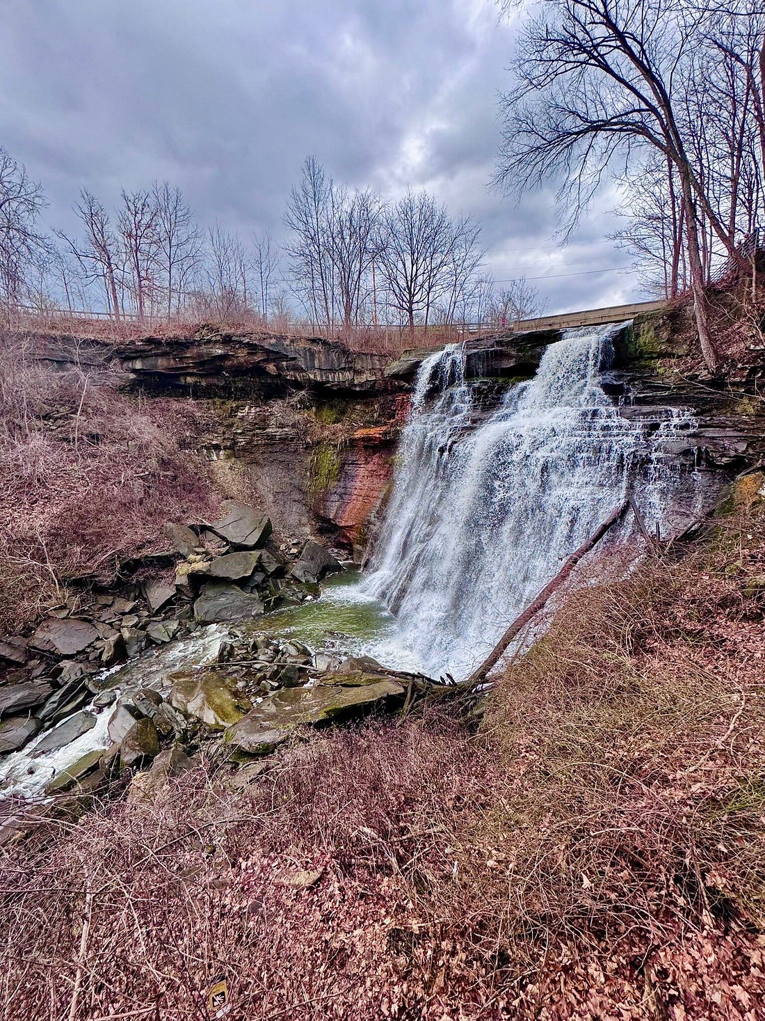 Brandywine Falls at Cuyahoga Valley National Park during the winter, highlighting one of the top waterfalls in US National Parks.