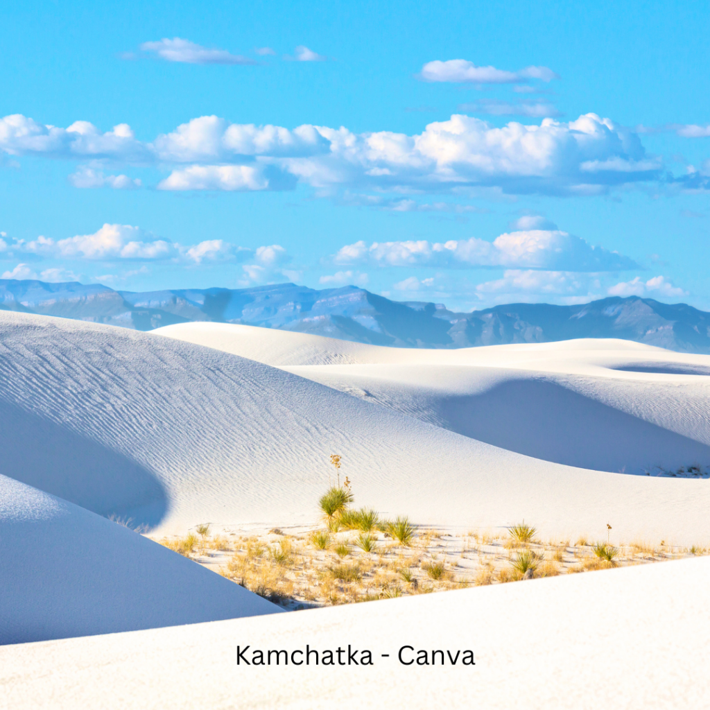 White Sands National Park desert dunes glowing under the sunset with rippled sand patterns.
