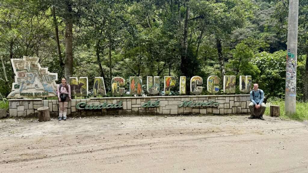 Posing with a Machu Picchu Sign